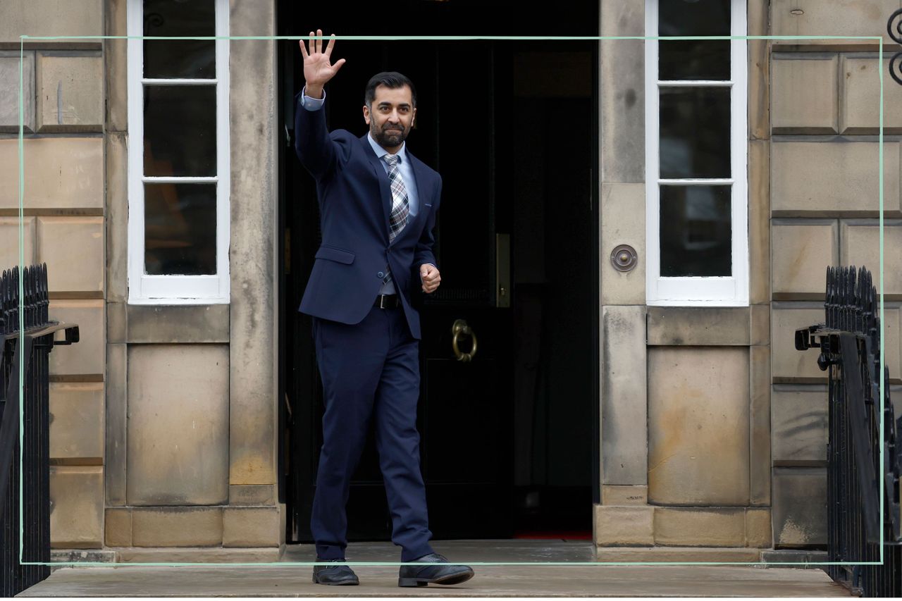 Humza Yousaf waving