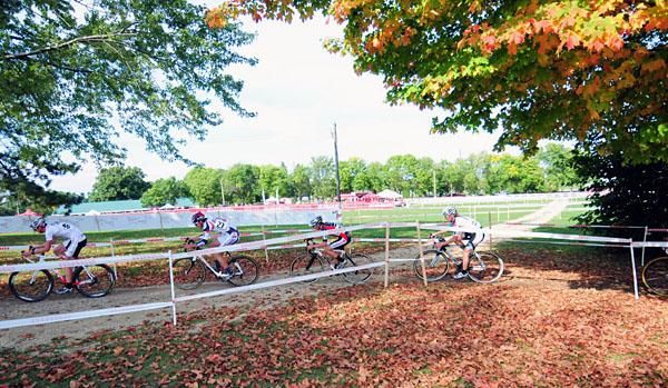 Riders passing through the leaves.