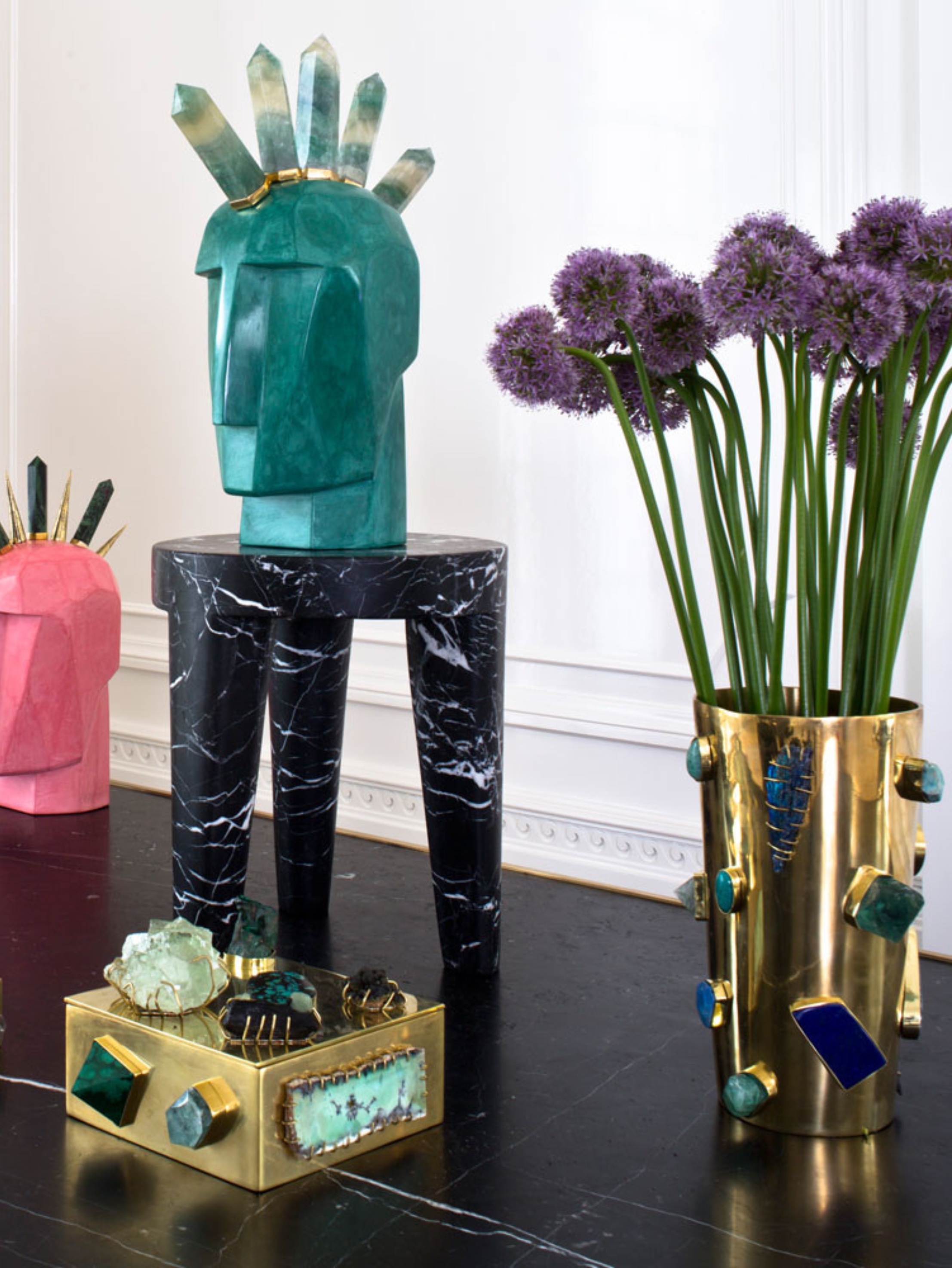 a range of decor from kelly wearstler combining brass and natural gemstones