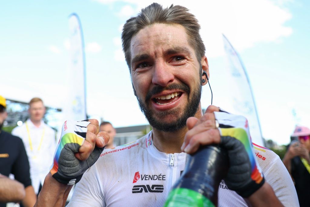 TotalEnergies team's French rider Anthony Turgis celebrates after winning the 9th stage of the 111th edition of the Tour de France cycling race, 199km stage departing and finishing in Troyes, on July 7, 2024. (Photo by MOLLY DARLINGTON / POOL / AFP)