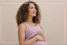 pregnant woman with curly hair to illustrate hair changes in pregnancy