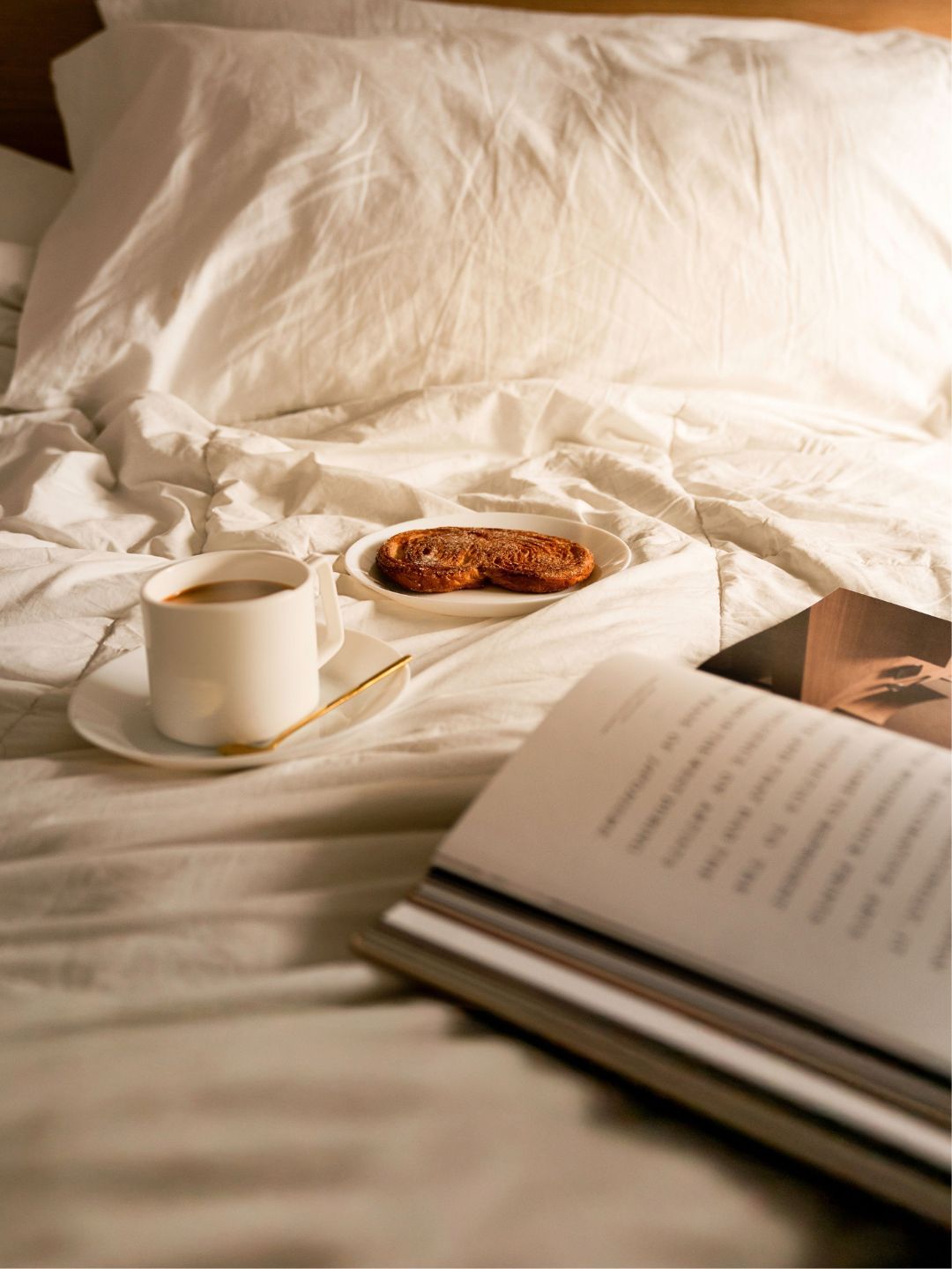 Cosy, autumnal scenes: a fire, tea and toast in bed, and plush pillows