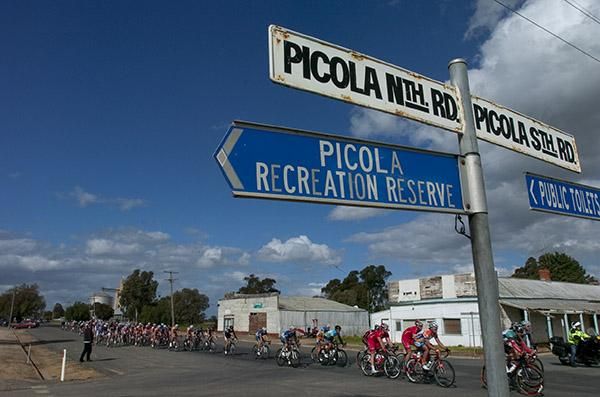 The peloton pass through Picola on stage four from Numurkah to Nathalia.