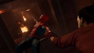 Spider-Man saving someone from a burning building