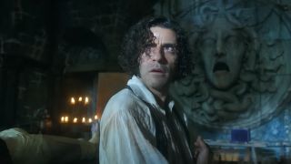 Oscar Isaac's Victor Frankenstein looking up in horror as lightning flashes.
