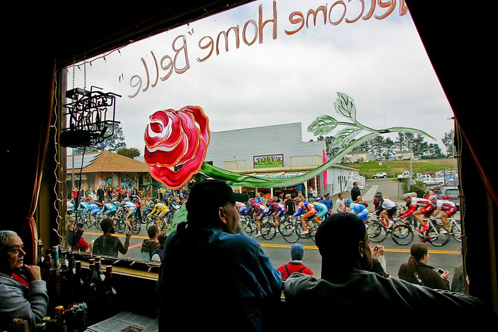 Passing through one of the fishing communities which had never seen a bike race before