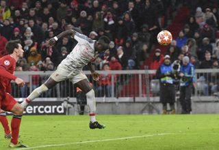 Sadio Mane heads in the second of his two goals against Bayern Munich