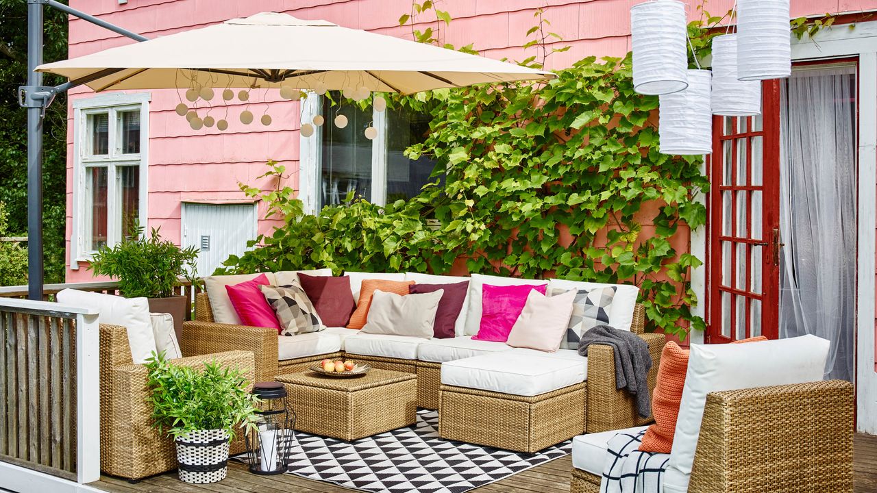 small deck ideas from Ikea with corner sofa and parasol