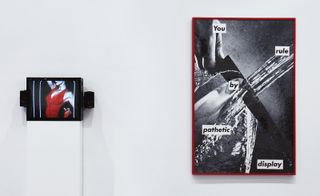 Left, a video work in a small television and right, a large monochrome artwork in a red frame by Barbara Kruger