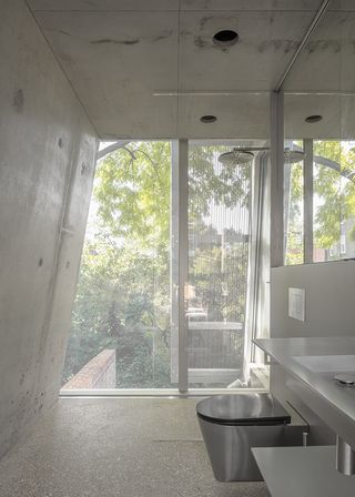 bathroom at Reciprical House by GianniBotsfordArchitects