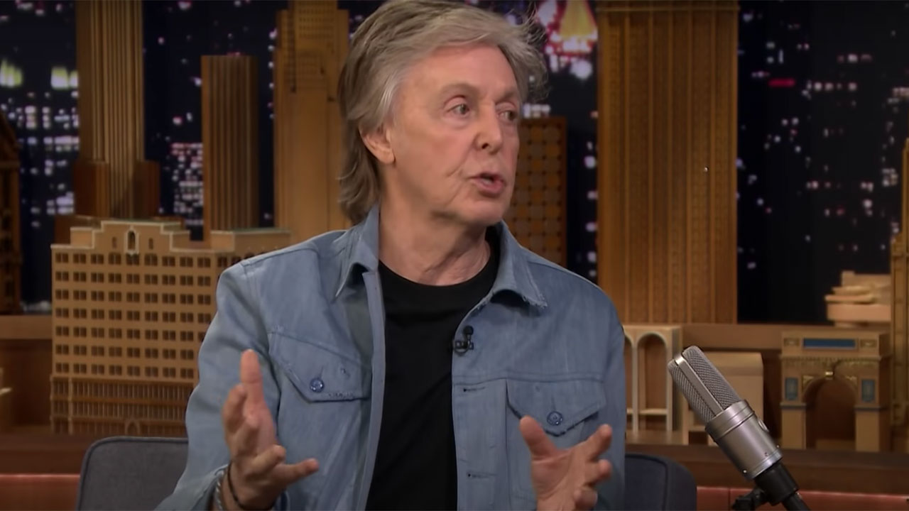 Paul McCartney sitting in a chair on The Tonight Show.