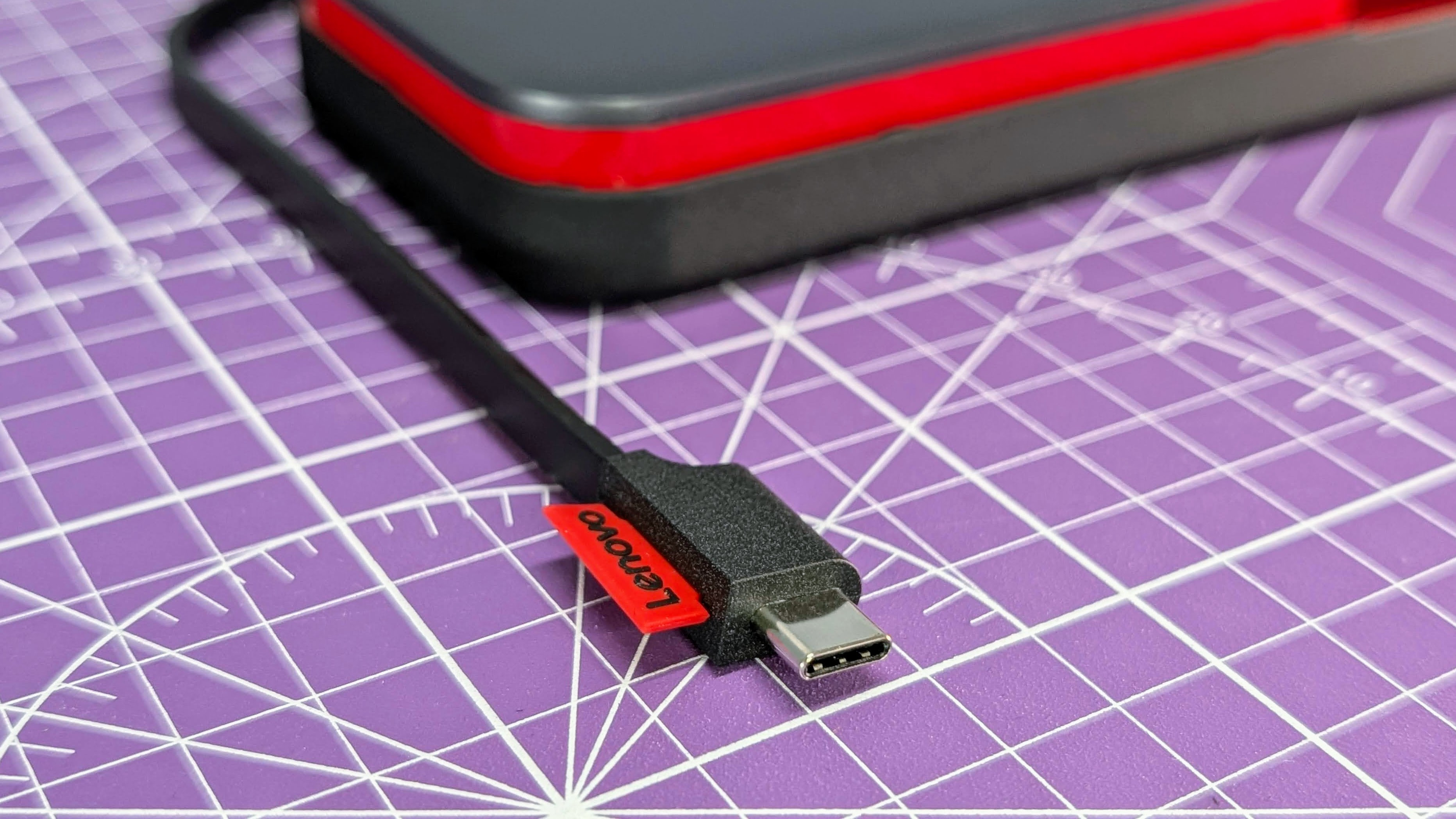 Lenovo Go USB-C laptop power bank close up of the end of the built-in USB-C cable