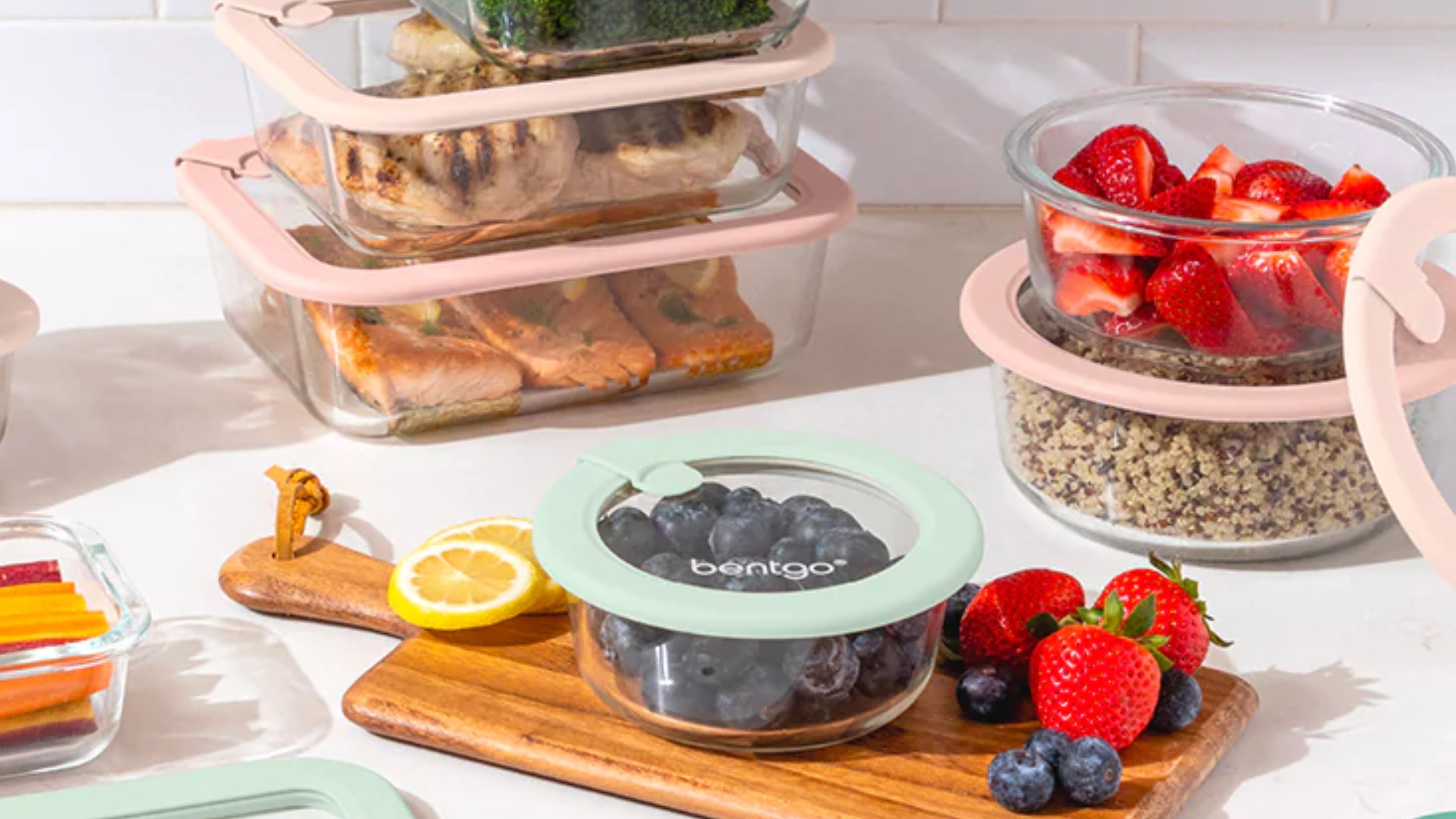 Glass food storage containers with matching lids. 