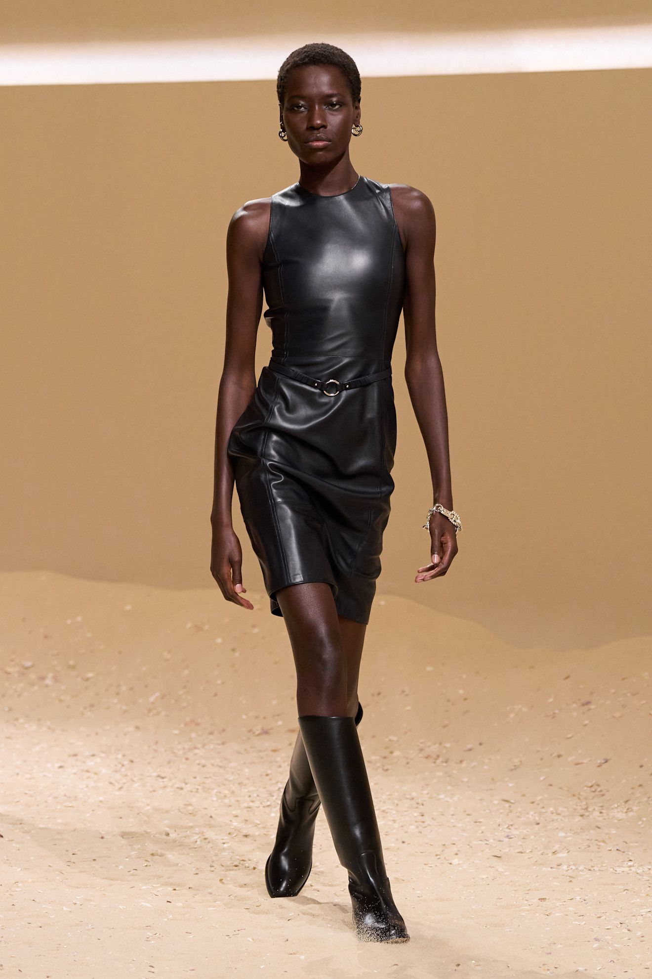 A model walks the hermes spring 2026 runway show in paris.
