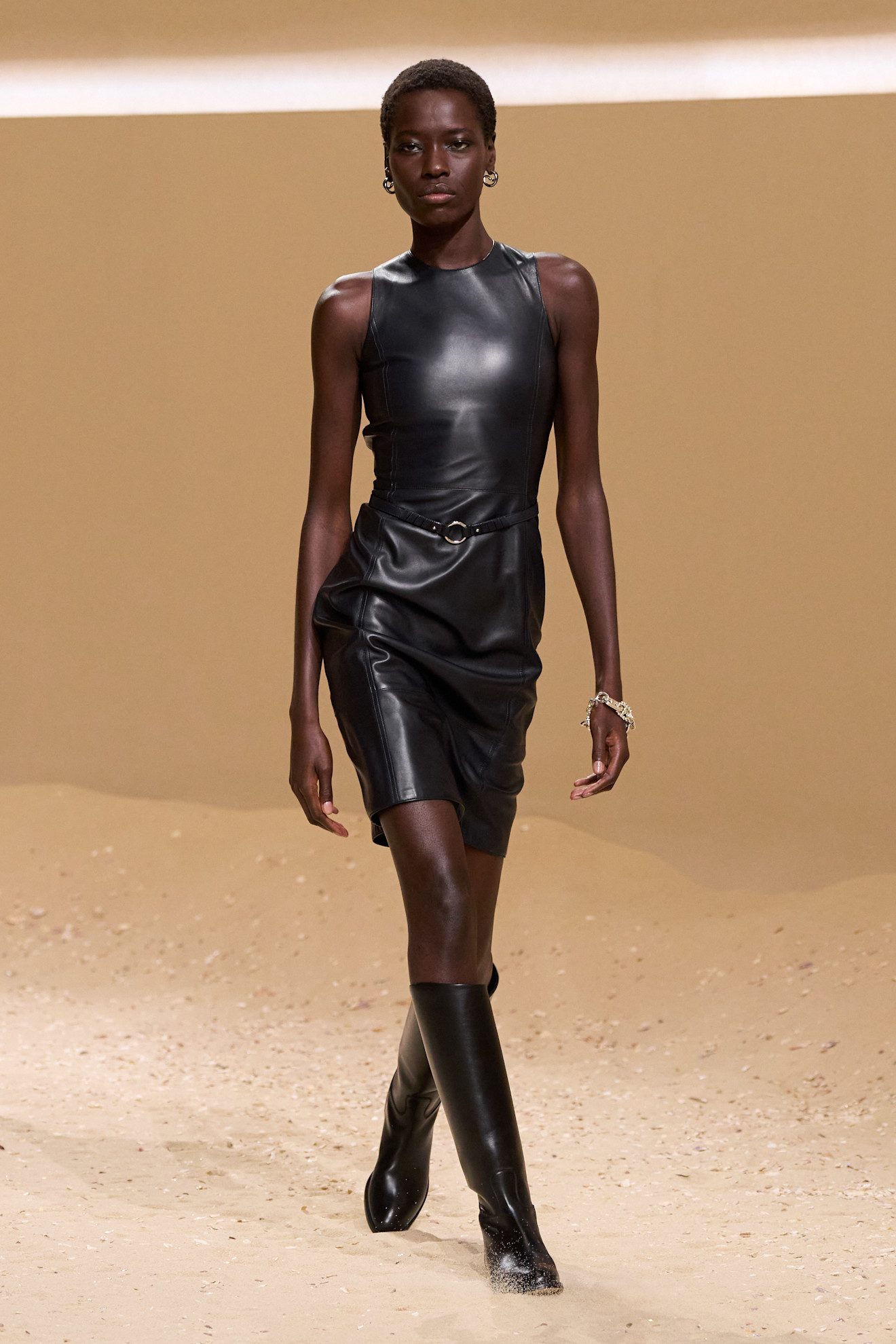 A model walks the hermes spring 2026 runway show in paris.