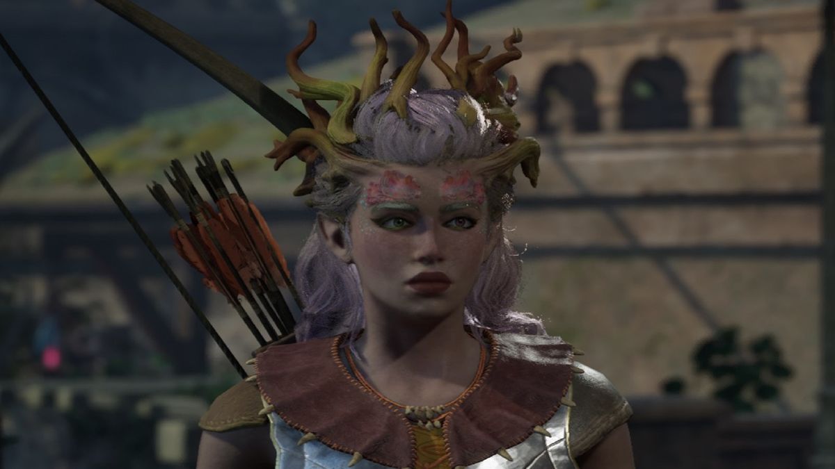 Avowed screenshot of a female godlike with treebark antlers, mushrooms decals on her face, and light pink hair with a bow on her back