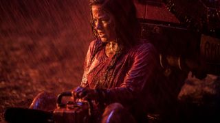 Jane Levy as Mia Allen covered in blood during the movie Evil Dead.