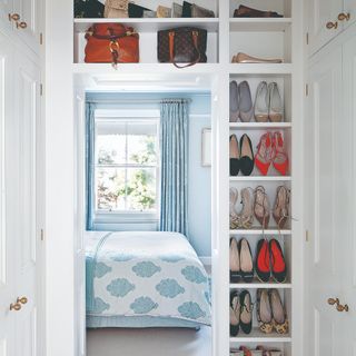 White bedroom with built in shoe storage