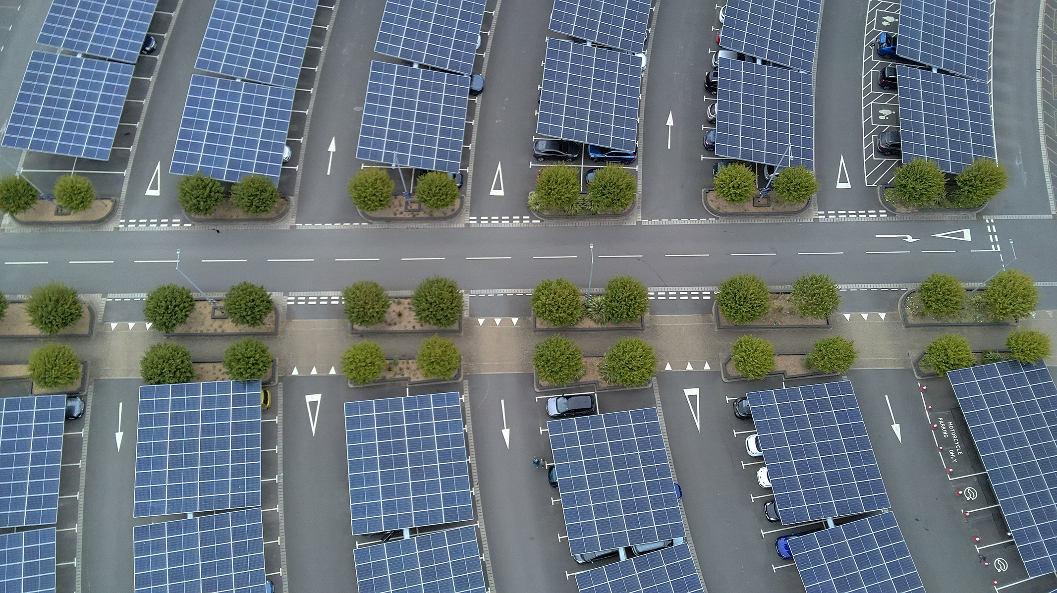 Photo of a car park with solar panels taken with a Bwine F7GIM drone