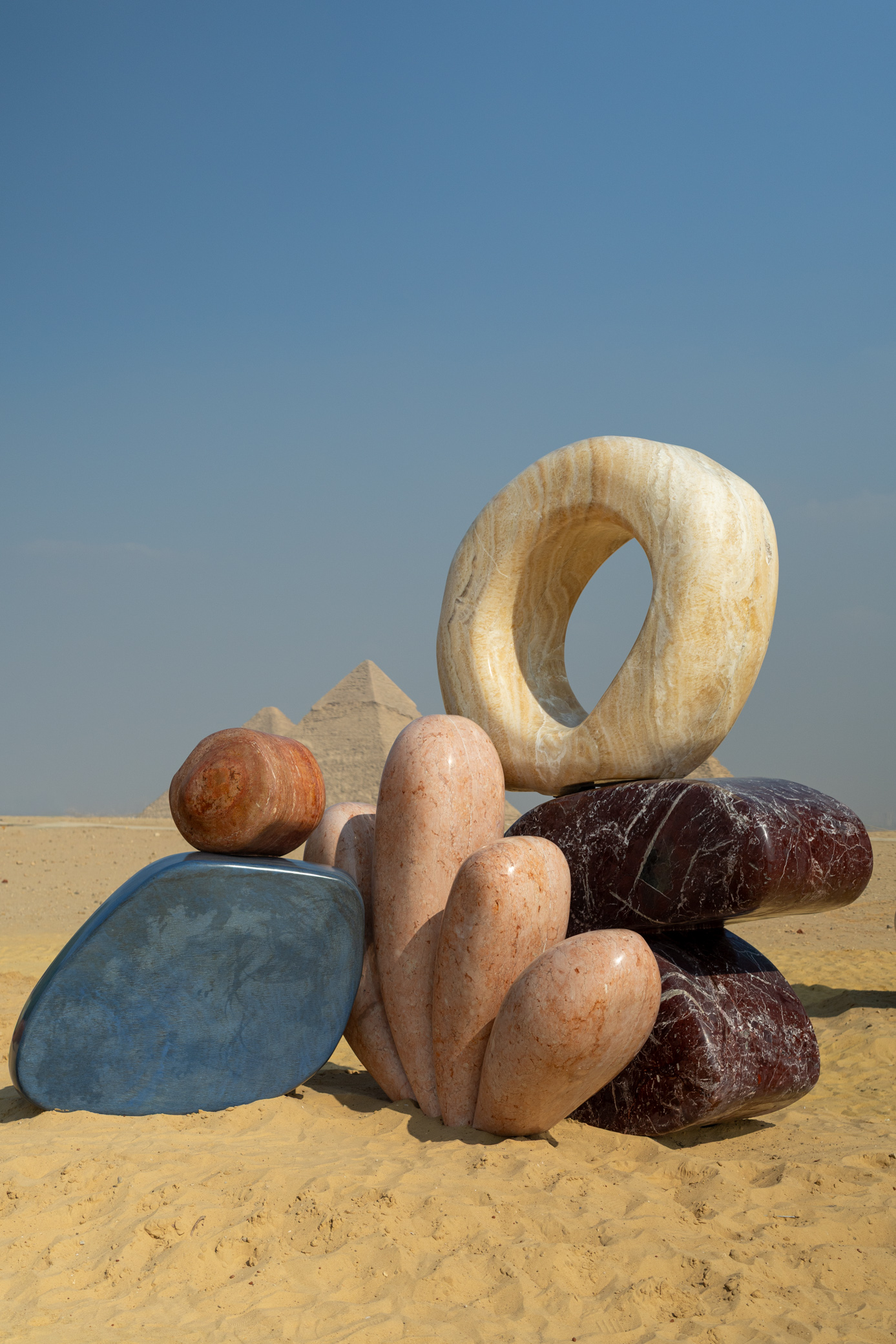 Giza Pyramids with colourful marble installation by Studio Proba