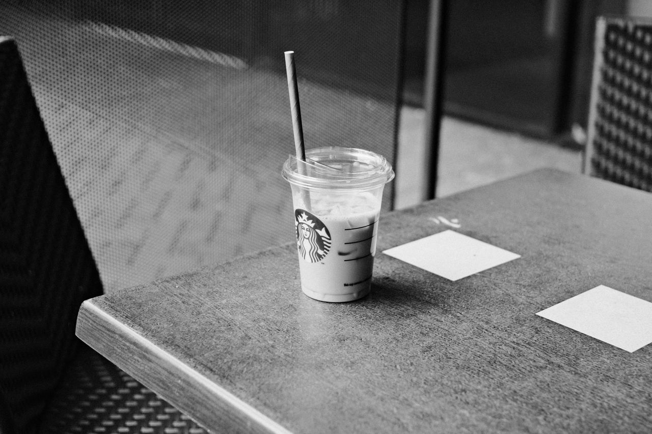 Iced coffee cup on a table in a cafe