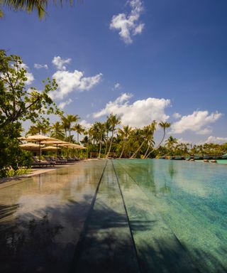 Patina Maldives natural beach and architectural pool