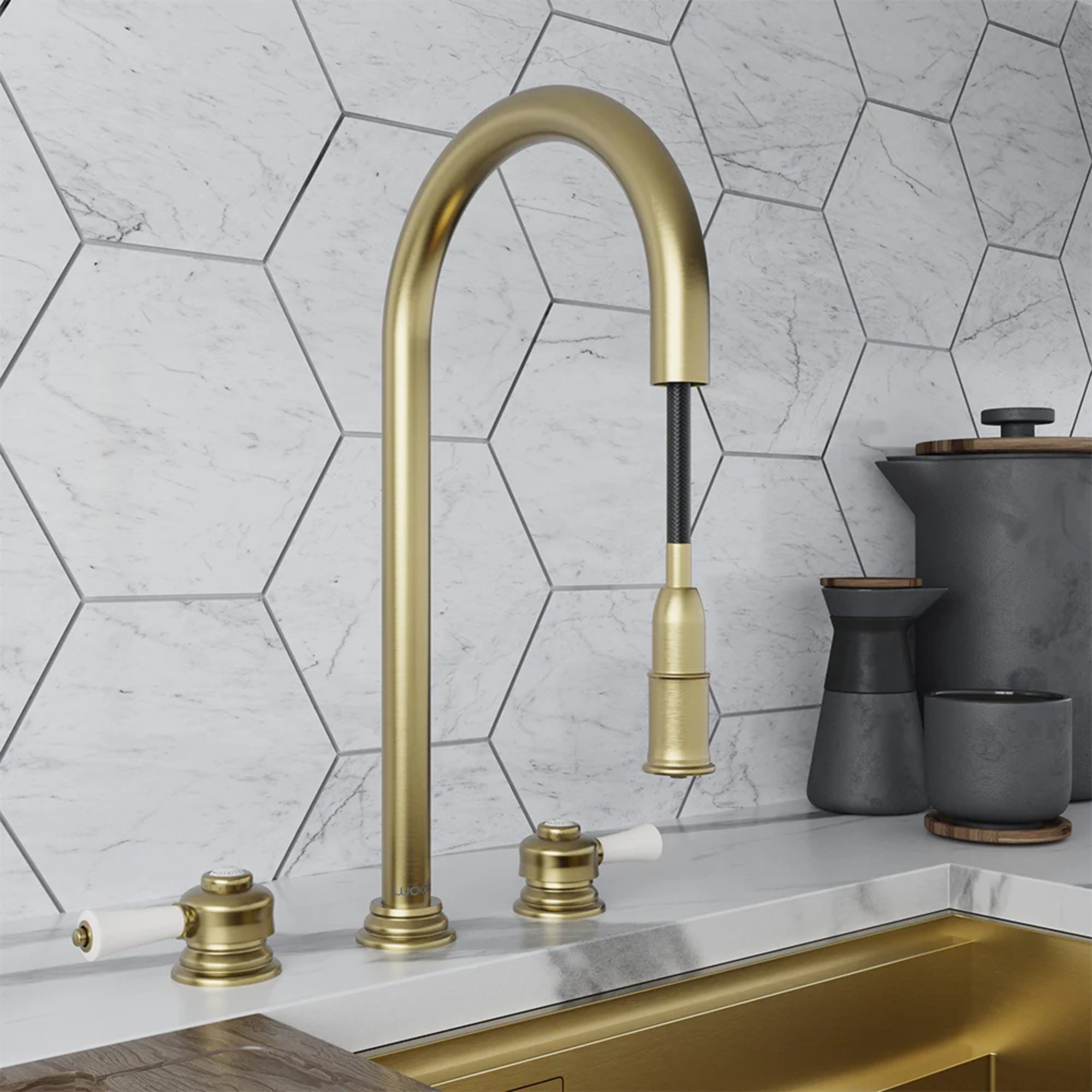 a brass boiling water tap over a brass kitchen sink