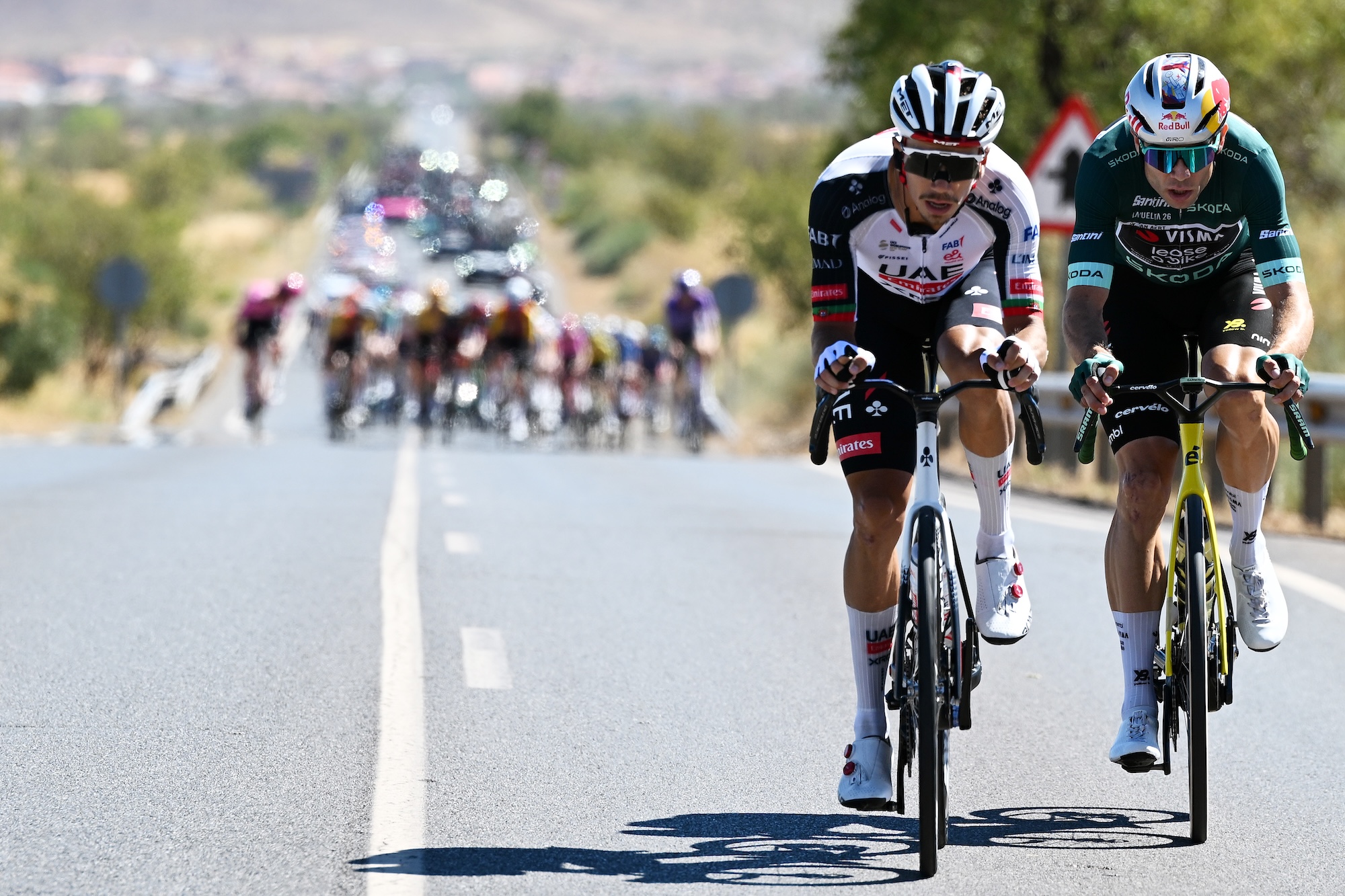 Ivo Oliveira and Wout Van Aert attack during the La Vuelta