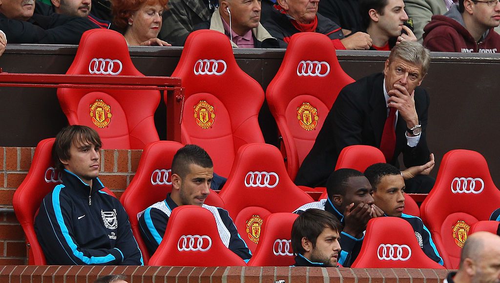 August 28, 2011: Arsene Wenger watches his team lose 8-2 at Old Trafford and decides to sign Per Mertesacker. (Photo by Alex Livesey/Getty Images)