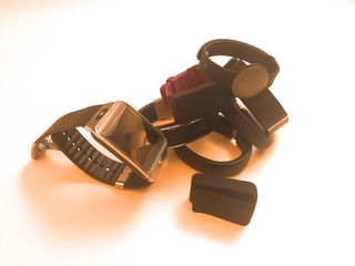 A pile of fitness trackers
