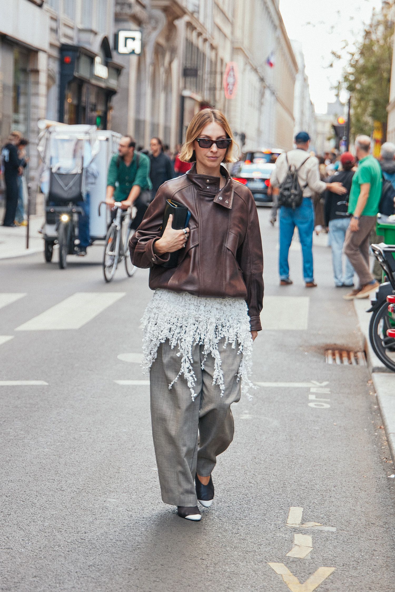 A Paris Fashion Week attendee shows off their outfit.