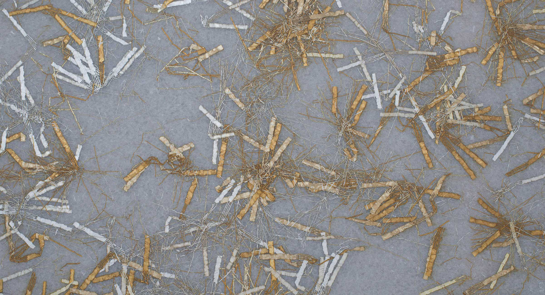 Tinsel embedded in plastic