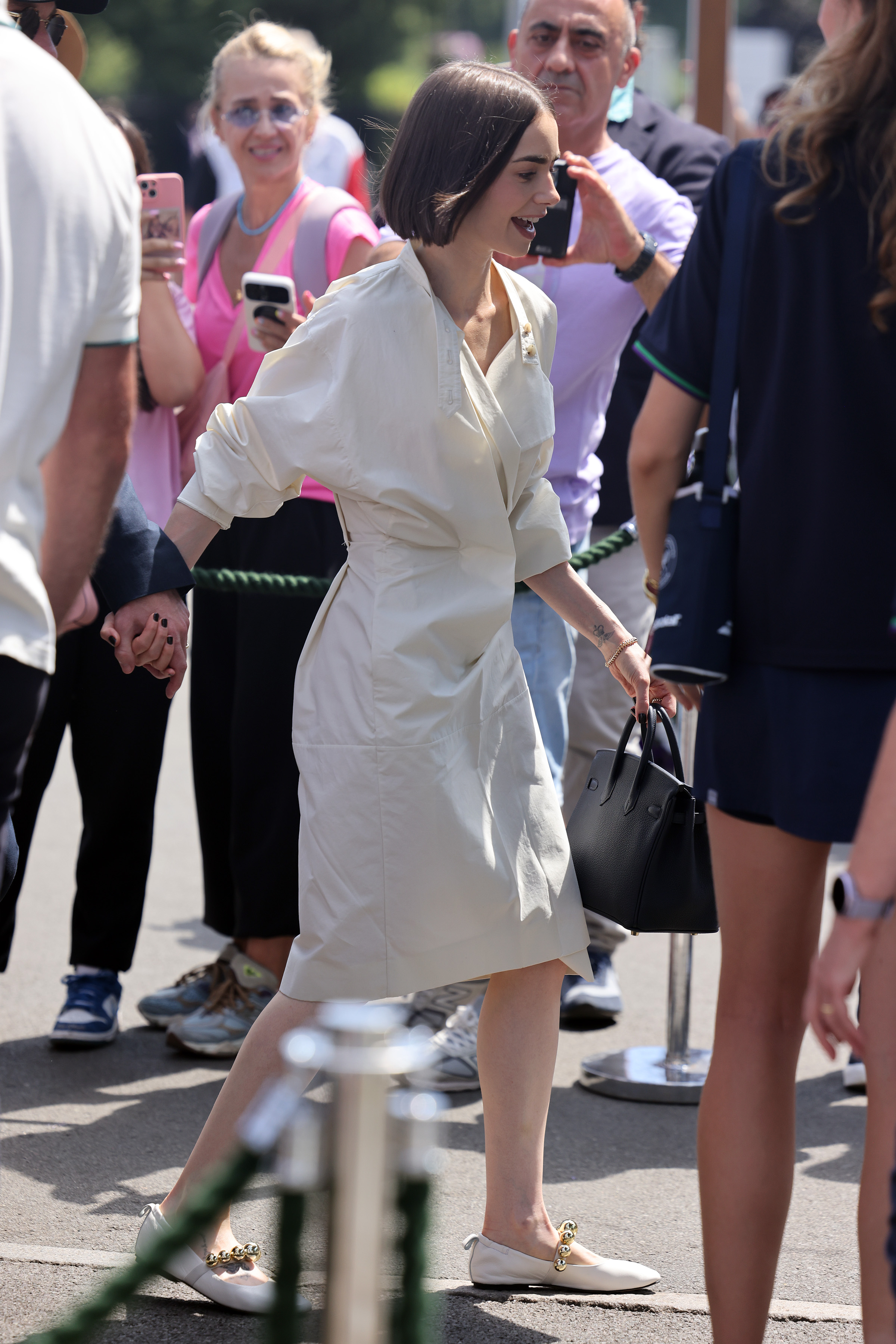 Lily Collins debuted her new Herm&amp;egrave;s Birkin bag during Wimbledon 2025