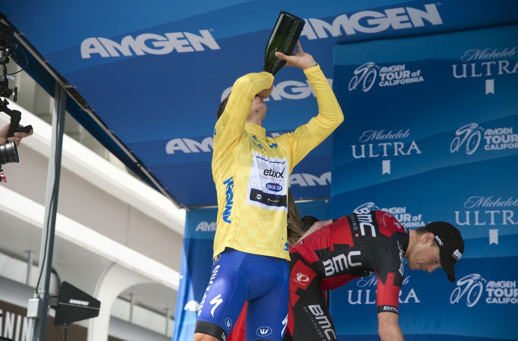 Julian Alaphilippe (Etixx Quickstep) taking a swip of the champagne