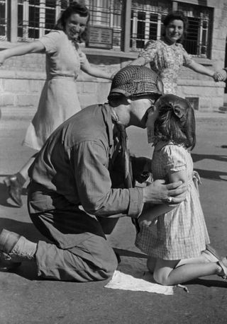 Tony Vaccaro's iconic Kiss of Liberation image, shot on 15 August, 1944