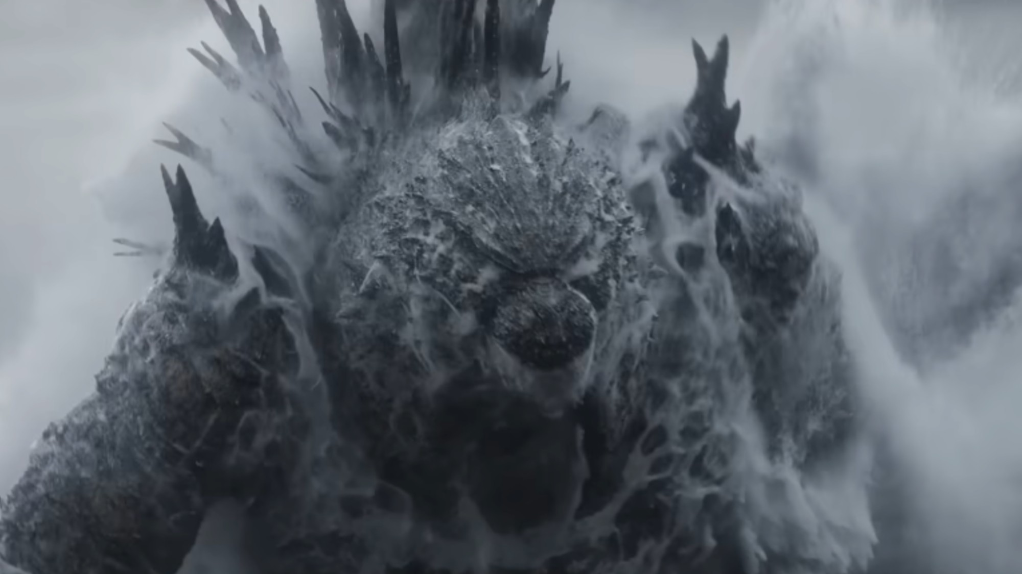 Godzilla coming up out of the water in Godzilla Minus Zero