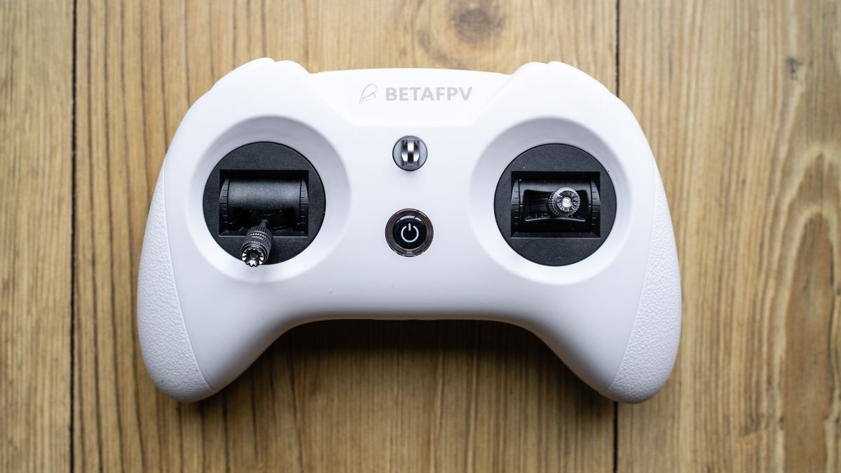 BetaFPX Cetus X drone controller on wooden table