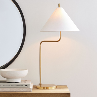 table lamp with curved, thin metal frame