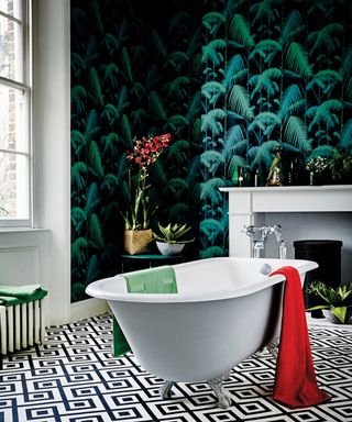 Luxury vinyl tile flooring in bathroom with freestanding bath by Carpetright