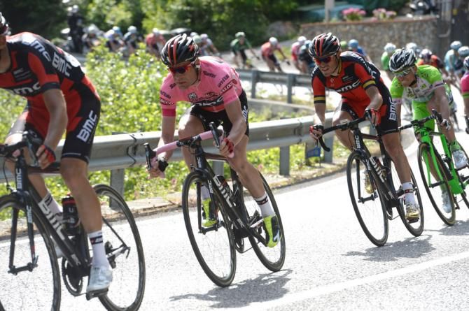 Cadel Evans sits safely in the peloton