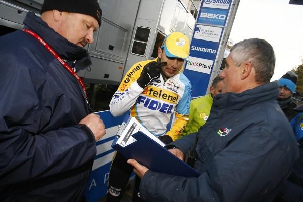 Rob Peeters is informed by the UCI commissaires that he was disqualfiied
