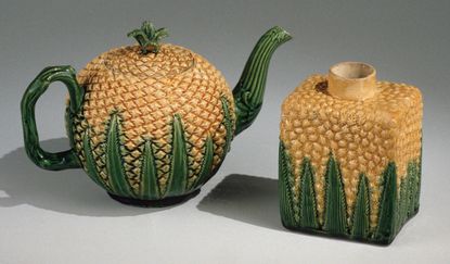 A Wedgwood pineapple-themed teapot and tea caddy.