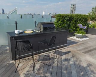 modern built-in BBQ on roof terrace