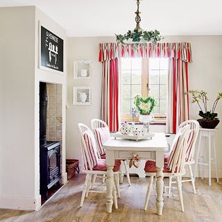 dining room with tea set and wooden flooring
