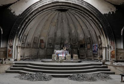 The altar of a damaged church in the town of Qaraqosh, south of Mosul.
