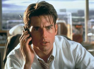 Tom Cruise as Jerry Maguire, on the phone in Jerry Maguire