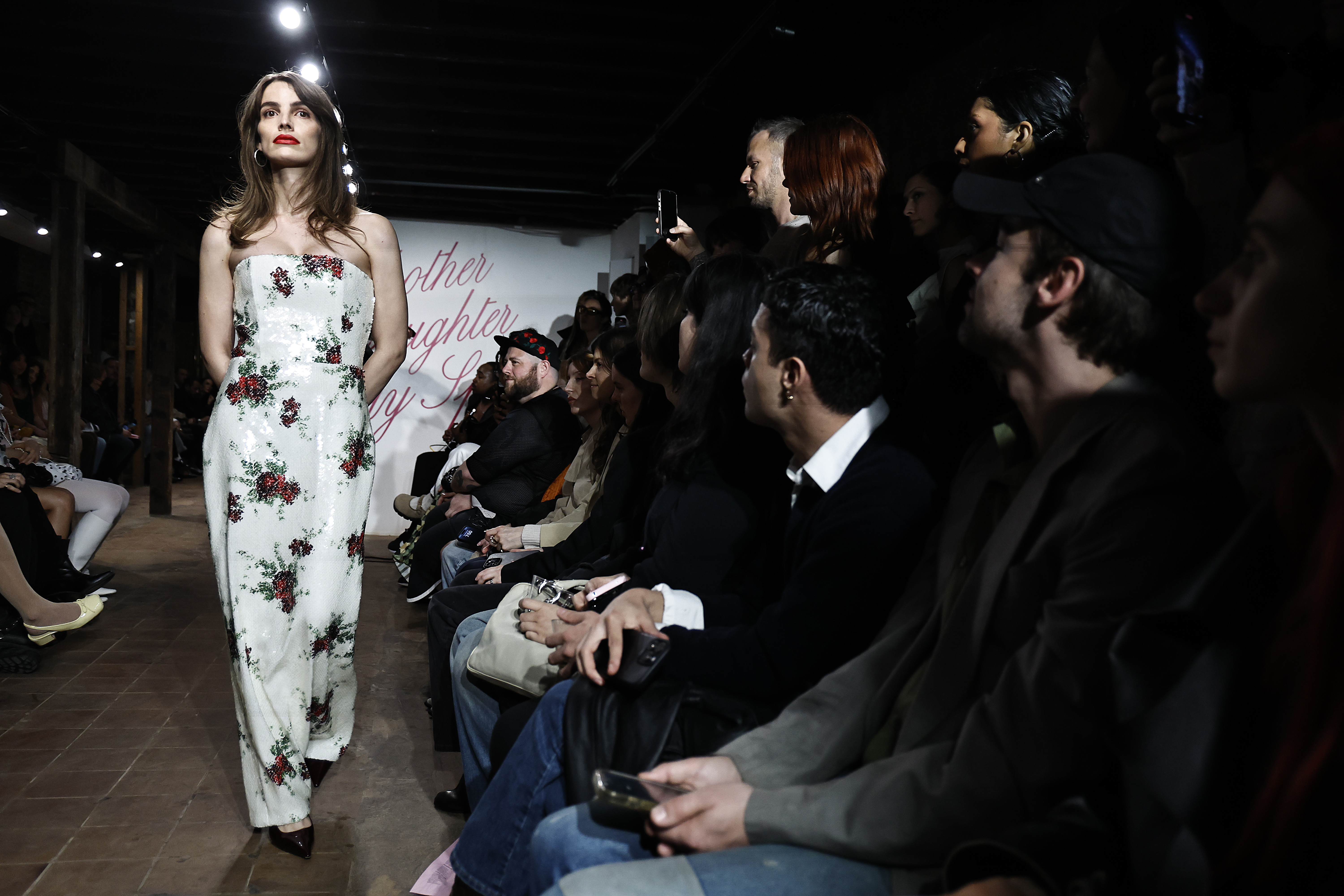 Lux Pascal wore a sequin floral dress at a fundraiser runway show in march