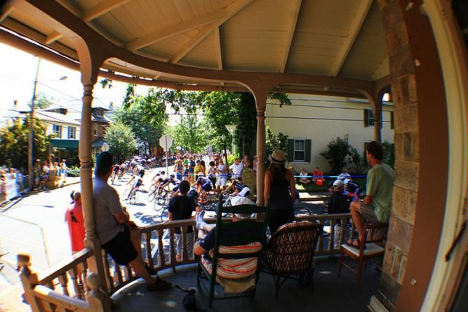 America's fastest growing sport rides by some friends enjoying an old fashioned viewing mode: Porchsurfing.