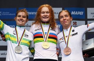 ZURICH SWITZERLAND SEPTEMBER 28 Gold medalist Puck Pieterse of Team Netherlands C Silver medalist Neve Bradbury of Team Australia L and Bronze medalist Antonia Niedermaier of Team Germany R pose on the podium during the 97th UCI Cycling World Championships Zurich 2024 Womens U23 Road Race a 1541km one day race from Uster to Zurich on September 28 2024 in Zurich Switzerland Photo by Tim de WaeleGetty Images