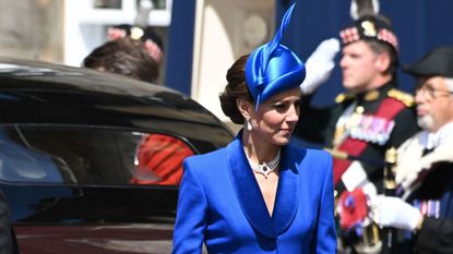 Princess Catherine's royal blue ensemble and pearl accessories exuded regal elegance as Her Royal Highness attended an event in Edinburgh
